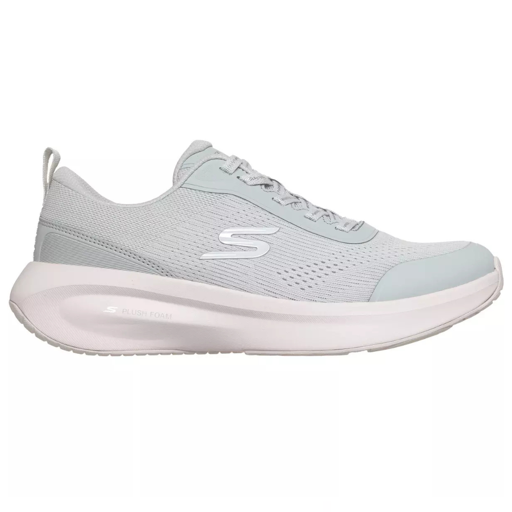 Light gray athletic shoe with a mesh upper, lace-up design, and thick cushioned sole featuring \“Plush Foam\“ for comfort.