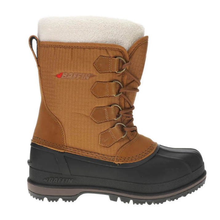 A tan and black winter boot with a rubber sole, faux fur lining, and lace-up front featuring metal eyelets.
