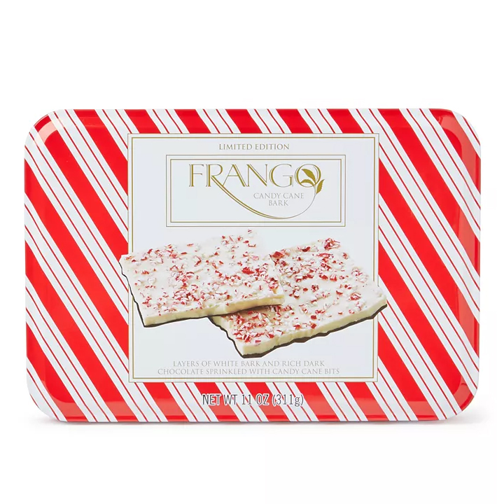 Frango Candy Cane Bark is a limited edition treat featuring layers of white bark and rich dark chocolate, sprinkled with candy cane bits. Packaged in a red and white striped tin, it weighs 11 oz (311 g).