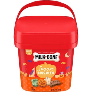 Milk-Bone Spooky Biscuits, limited edition dog snacks, in a 24 oz red container, featuring Halloween-themed treats for dogs of all sizes.