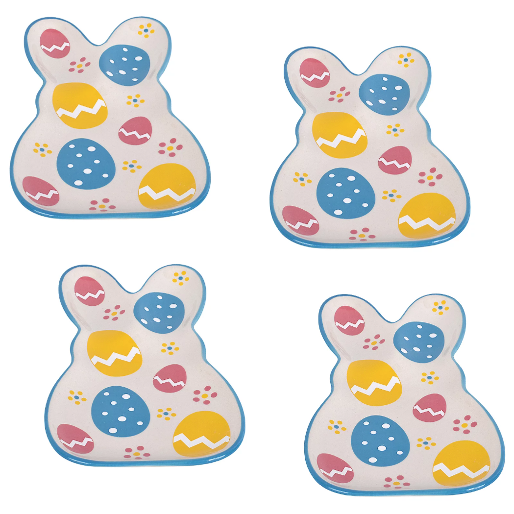 Four bunny-shaped plates feature colorful Easter egg designs with blue, yellow, and pink accents, outlined in blue.