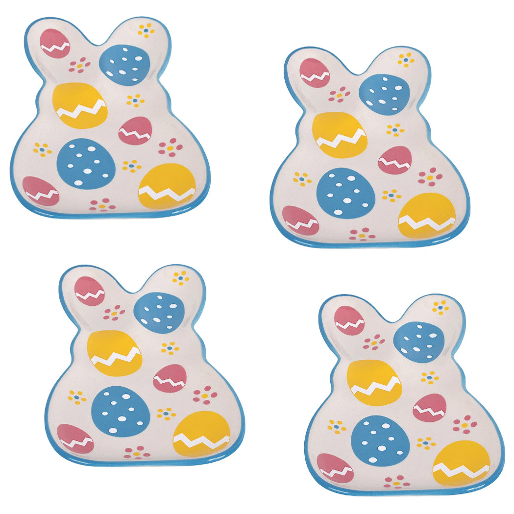 Four bunny-shaped plates feature colorful Easter egg designs with blue, yellow, and pink accents, outlined in blue.