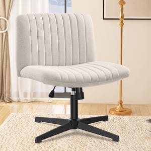 A beige, upholstered swivel chair with vertical stitching and a black metal base, set on a light-colored rug in a bright room.