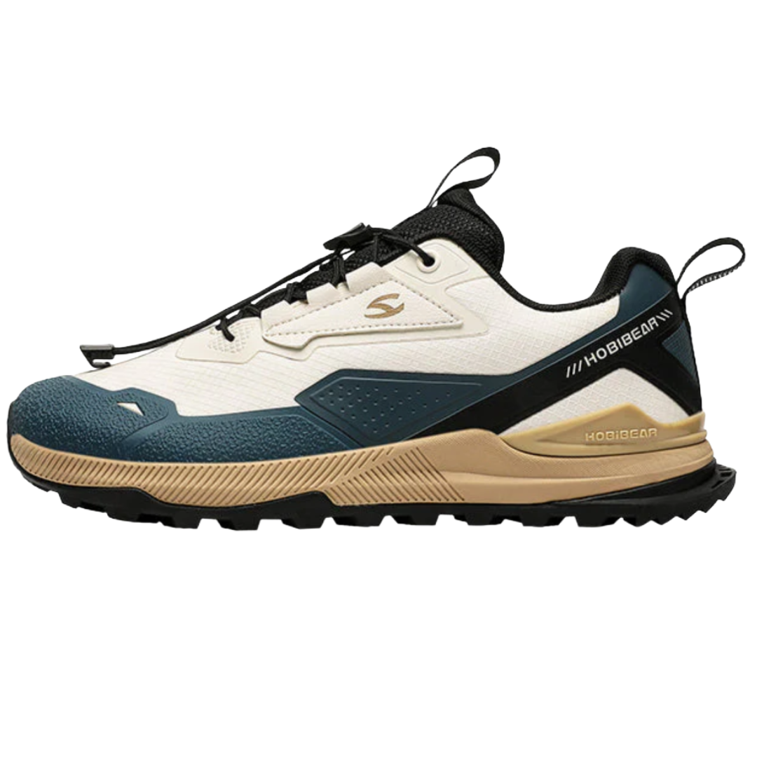 A sneaker with a white upper, blue and tan accents, black laces, and a textured sole, featuring the Hobibear brand logo.