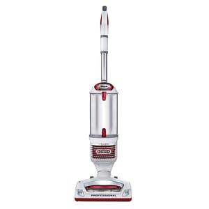 A Shark Rotator Professional vacuum cleaner with a sleek white and red design, featuring a lift-away pod and a clear dust container.