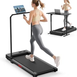 A foldable treadmill with a detachable handlebar, shown in use as both a running machine and a walking desk, where a woman runs with a remote and another works on a laptop.