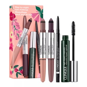Clinique Day-to-Night Eye Makeup Set includes two shadow wands, an eyeliner, and High Impact Mascara. The set is packaged in a pink floral box.