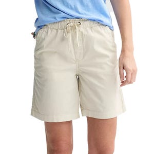 Light beige Bermuda shorts with a paperbag waist, featuring an elastic waistband and drawstring for adjustment. Made from lightweight fabric for casual and comfortable wear.