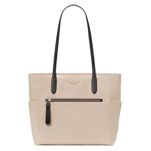 Kate Spade Chelsea Large Tote in taupe with black leather handles, features a front zip pocket, side pockets, and gold-tone logo detailing. Perfect for carrying essentials in style.