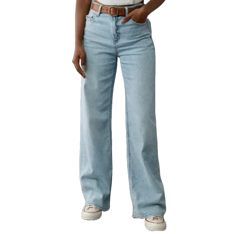 Light blue, baggy high-waisted jeans with a loose fit and wide legs, paired with a brown belt and casual sneakers.