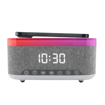 A digital alarm clock with wireless charging pad, LED time display, and control buttons for settings, music, and lights.