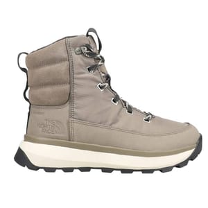 The North Face snow boots are tan with ankle-high lace-up design, featuring padded collars, dual-material uppers, and rugged outsoles for traction. They have \“The North Face\“ logo on the side and D-ring lace eyelets.
