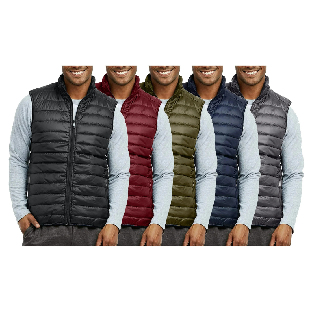 Five men's puffer vests in different colors: black, red, olive green, navy blue, and charcoal gray, worn over light gray long-sleeve shirts.