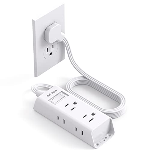 A flat plug power strip with multiple outlets and a long, flexible cable connected to a wall socket.