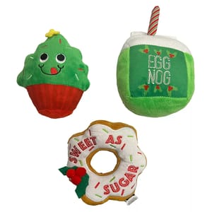 Three plush dog toys designed to resemble a Christmas-themed cupcake, a carton of eggnog, and a donut with \“Sweet as Sugar\“ text, each with a festive color scheme and accents.