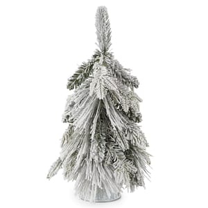 A 16-inch downswept pine tree decorated with artificial snow, creating a frosted, wintry appearance. It's compact and suitable for seasonal decoration.