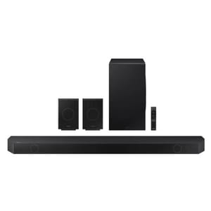Samsung ATMOS Soundbar system includes a sleek black soundbar, two compact rear speakers, a large subwoofer, and a remote control, designed to enhance audio with surround sound capabilities.