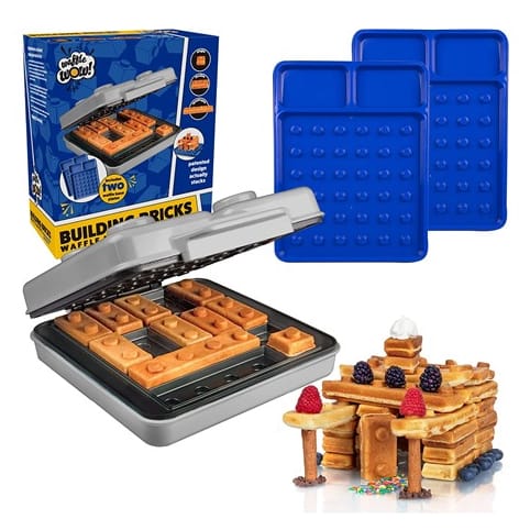 Building Brick Electric Waffle Maker creates waffle pieces resembling building blocks. It includes two removable blue silicone molds and an example of a waffle structure topped with berries and syrup.
