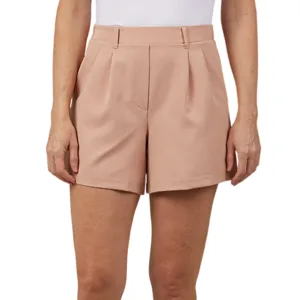 Beige high-waisted shorts with front pleats, paired with a white top and brown ballet flats featuring lace-up details.