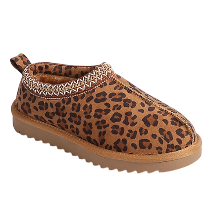 A leopard print slip-on shoe with a brown sole and decorative stitching around the opening.