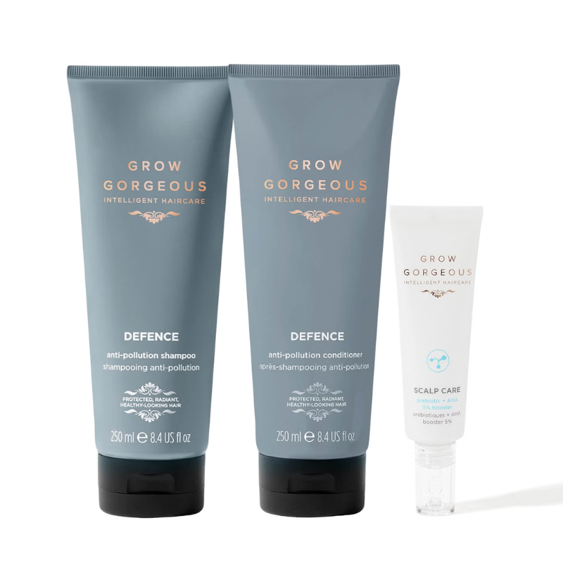 Three hair care products labeled \“Grow Gorgeous,\“ including an anti-pollution shampoo, an anti-pollution conditioner, and a scalp detox treatment, all in teal tubes with white and orange text.