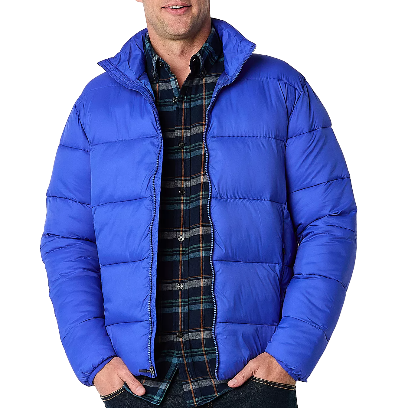 A blue puffer jacket from St. John's Bay features a quilted design with a zippered front. It is worn over a dark plaid button-up shirt.