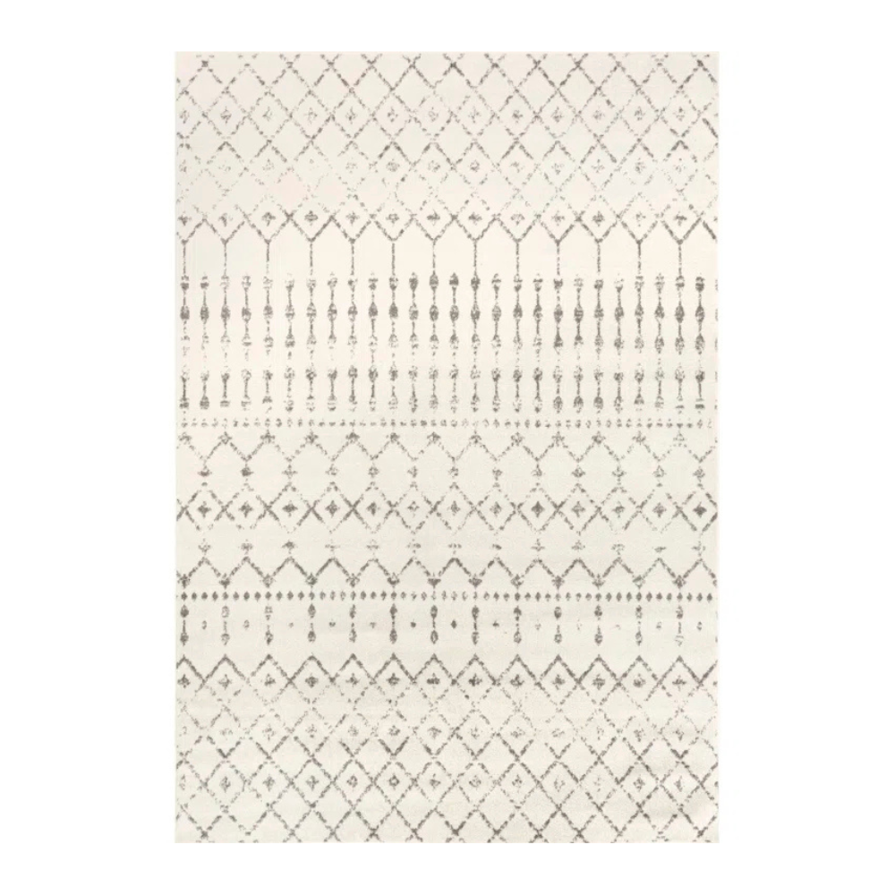 A beige rug with a geometric pattern featuring diamond and vertical line designs in a muted tone.