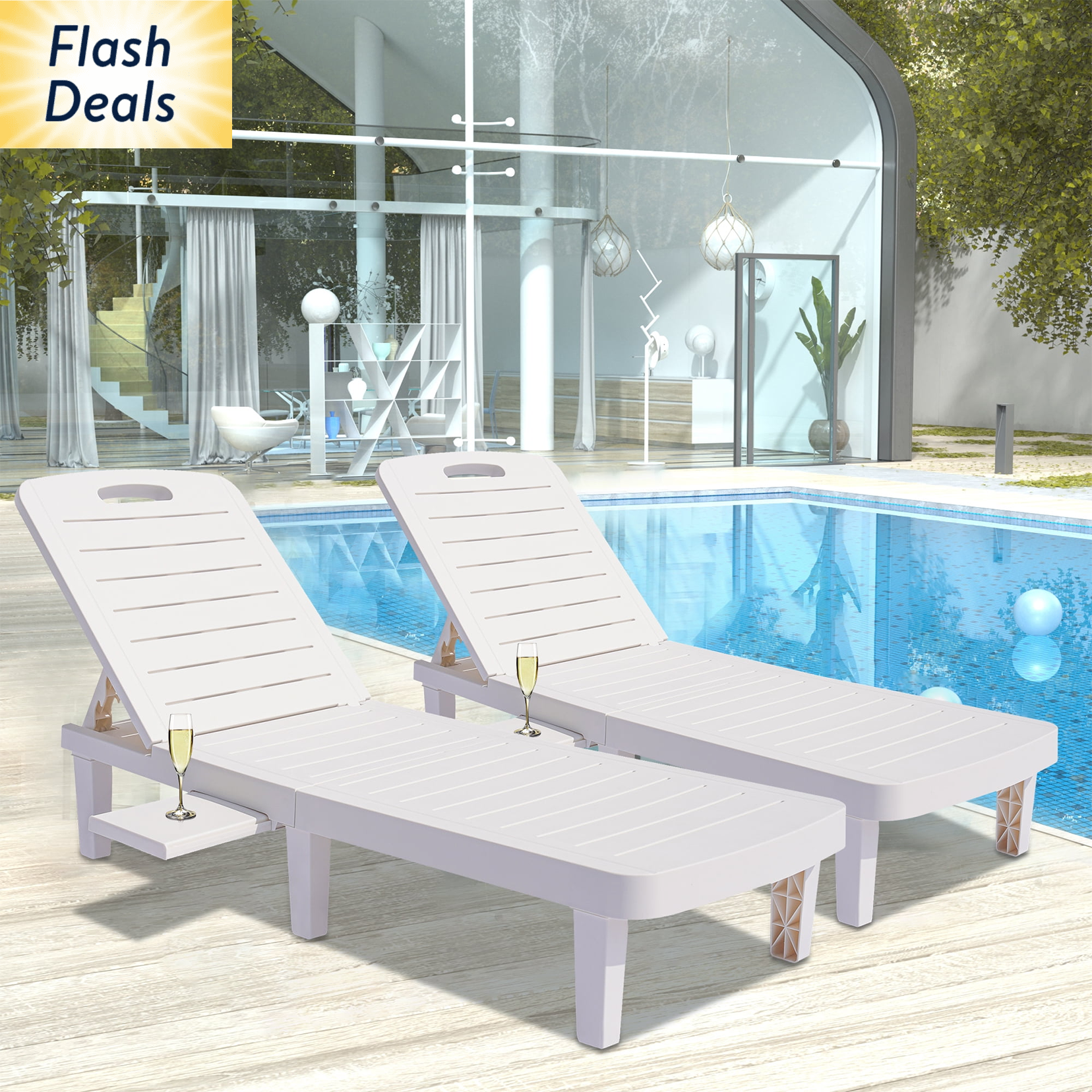 Two adjustable outdoor sun loungers with attached side tables, positioned by a pool.