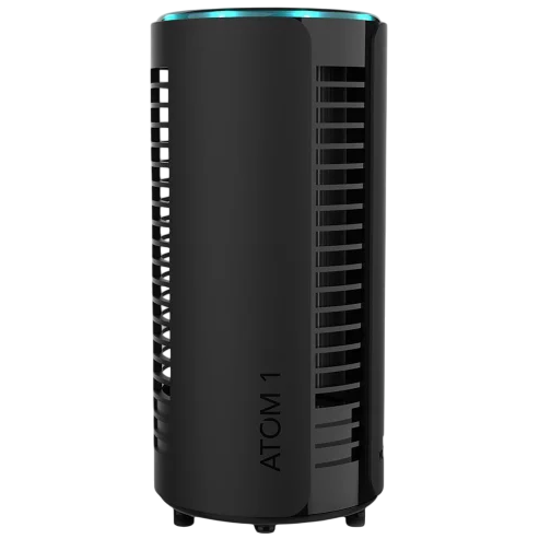 A cylindrical black air purifier with vertical slits and a glowing blue top, labeled \“ATOM 1.\“