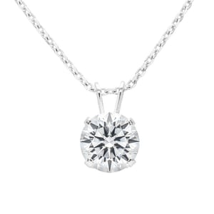A 2-carat diamond solitaire necklace featuring a round diamond set in a four-prong mount, suspended from a delicate silver chain.