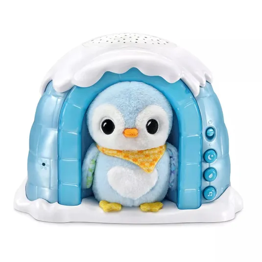 A plush penguin toy in a blue igloo with buttons on the side for different functions, such as music and sounds.