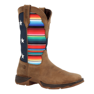 A cowboy boot with brown leather foot and a colorful fabric shaft featuring stripes and stars, brand \“Durango\“ embossed on the pull tab.