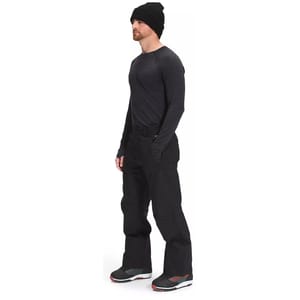 Black North Face ski pants with a relaxed fit, featuring belt loops and pockets. The pants are paired with black boots and a dark long-sleeve shirt, suitable for cold weather activities.
