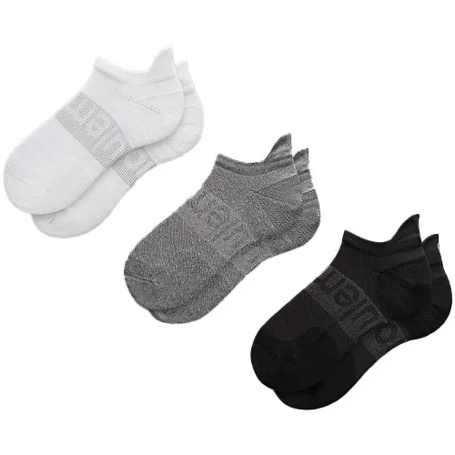 Three pairs of low-cut socks in white, gray, and black, each with a ribbed band and a subtle logo.