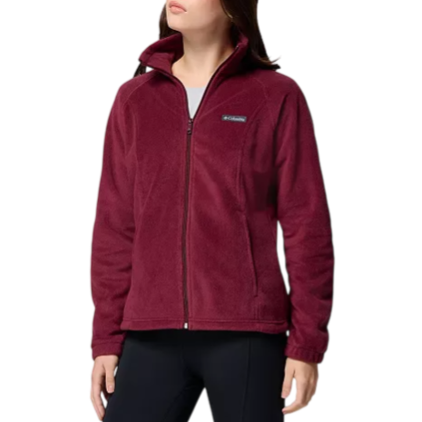 A person is wearing a maroon Columbia fleece jacket with a front zipper and high collar, paired with black pants.