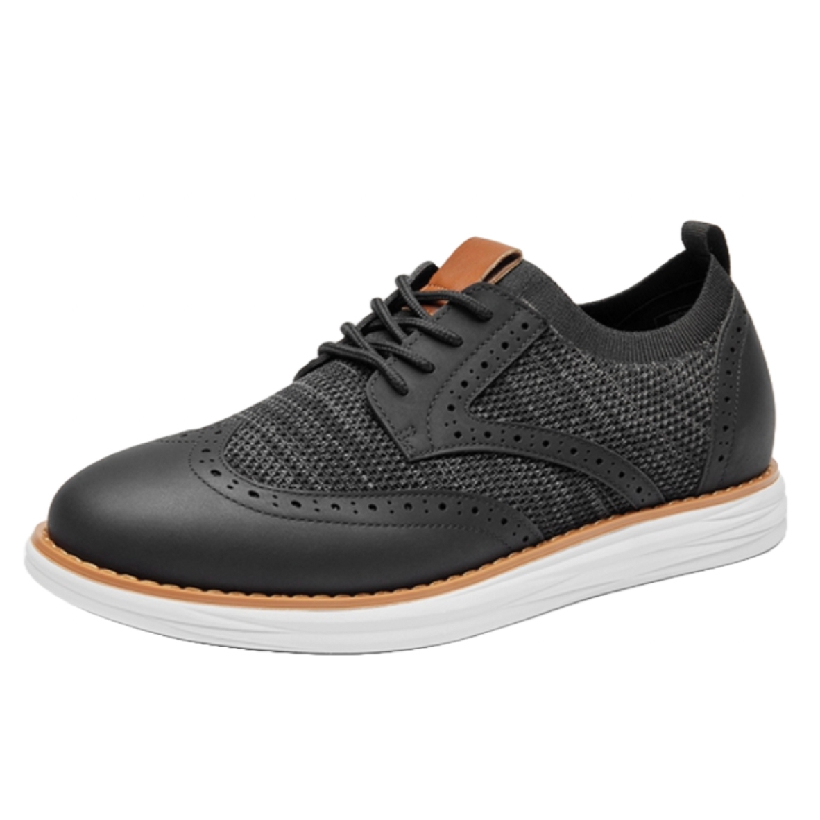 Men's Wingtip Mesh Oxfords featuring black leather accents, perforated detailing, and a knitted mesh upper, paired with a white cushioned sole and a small brown tongue accent.