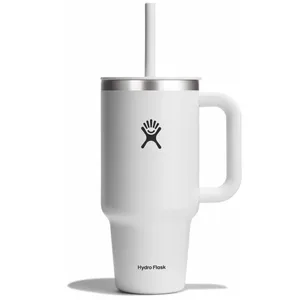 A white Hydro Flask tumbler with a handle and straw, featuring the brand's logo on the front.