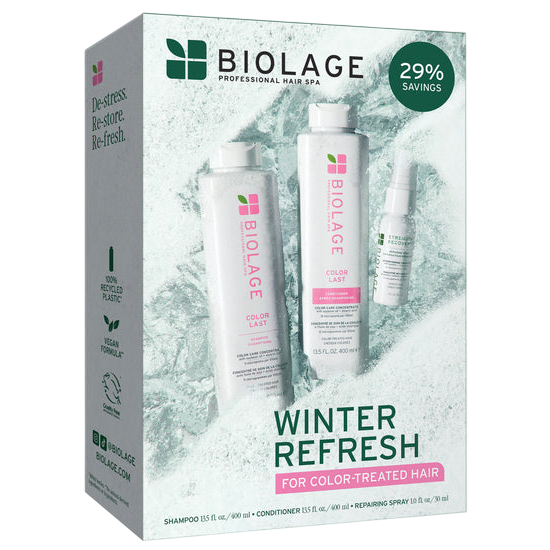 Biolage Winter Refresh set for color-treated hair includes a 13.5 fl oz shampoo, 13.5 fl oz conditioner, and a 1 fl oz repairing spray, offering 29% savings. The packaging highlights 100% recycled plastic and a vegan formula.