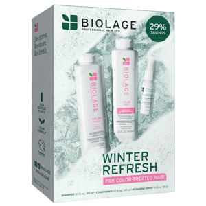 Biolage Winter Refresh set for color-treated hair includes a 13.5 fl oz shampoo, 13.5 fl oz conditioner, and a 1 fl oz repairing spray, offering 29% savings. The packaging highlights 100% recycled plastic and a vegan formula.
