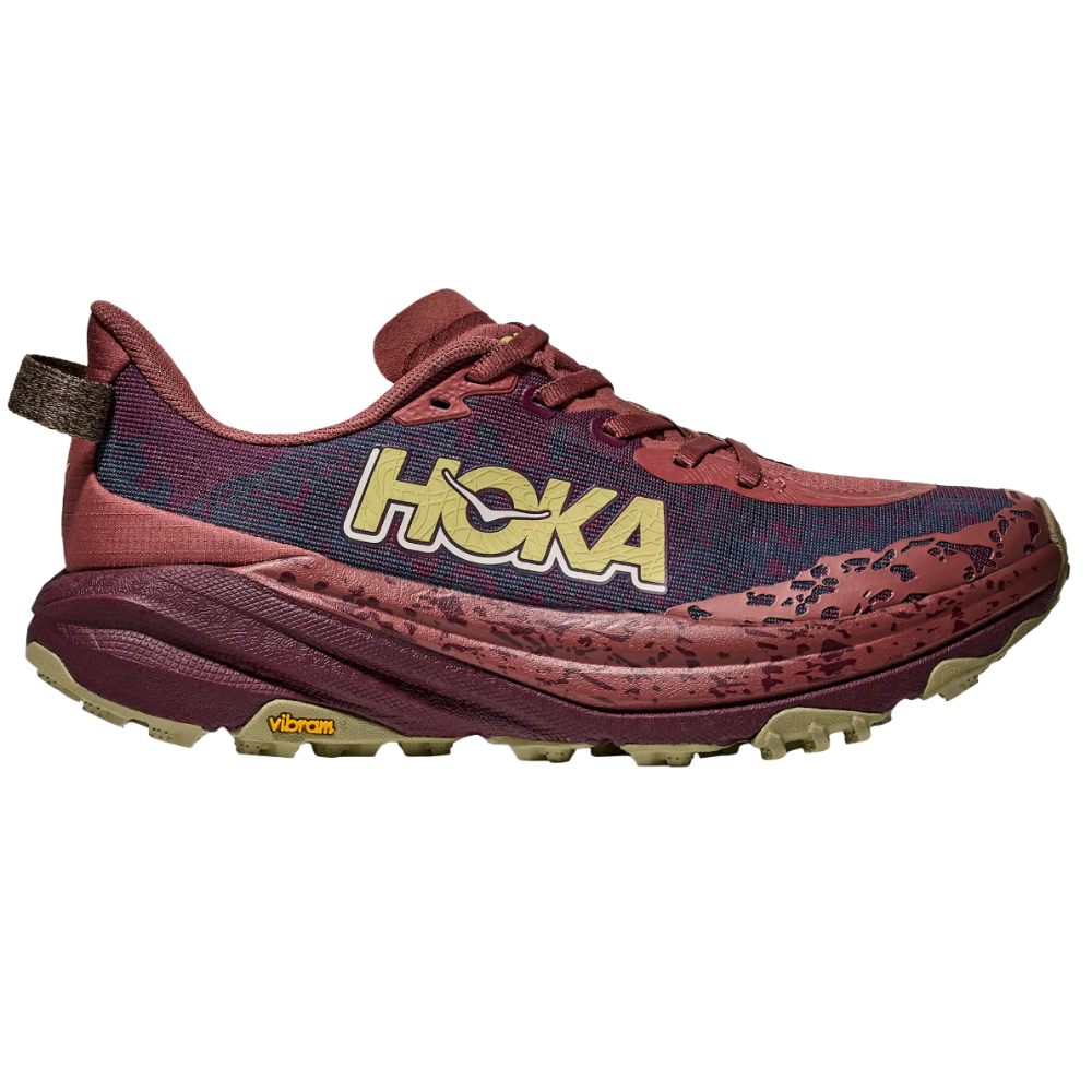 Hoka trail running shoe in maroon and burgundy with a Vibram sole and large Hoka logo on the side.
