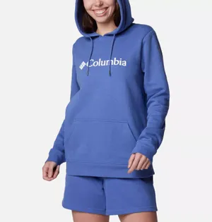 A person is wearing a blue hoodie with the Columbia brand logo and matching blue shorts.