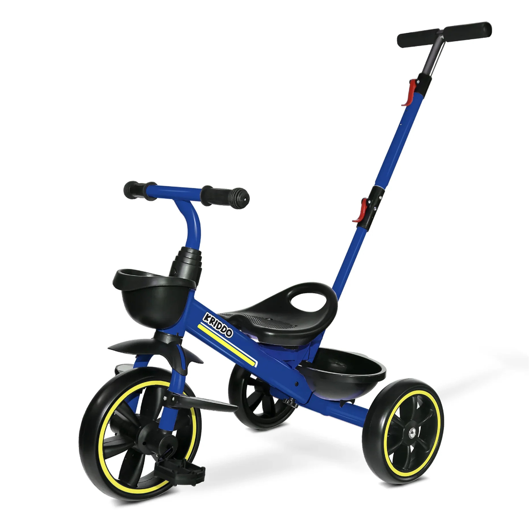 A blue tricycle with yellow rim accents, featuring a handlebar, pedals, a front basket, and a push handle for parental control.