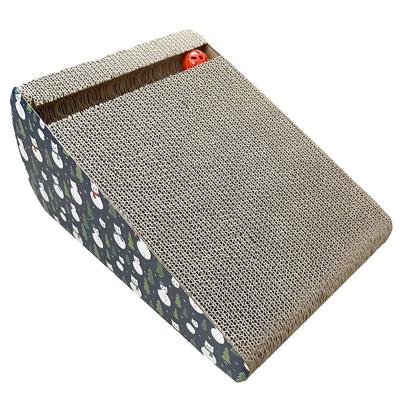 A wedge-shaped cardboard cat scratcher with a Christmas pattern on the sides and a small rolling ball feature. It includes catnip to attract cats.
