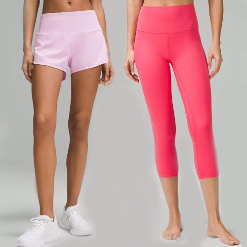 Two women showcasing light pink shorts and bright pink capri leggings, both paired with white sneakers.