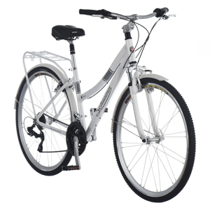 The Schwinn Discover Hybrid Bike features a white frame, rear cargo rack, front suspension fork, and a padded seat for comfort. It has a step-through design, multi-speed drivetrain, and fenders for weather protection.