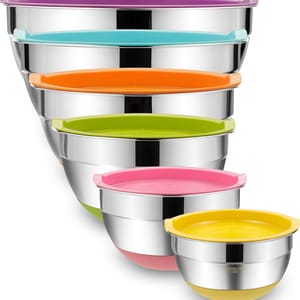 Six stainless steel mixing bowls with colorful airtight lids in purple, blue, orange, green, pink, and yellow. The bowls are stackable for easy storage.