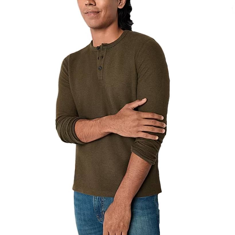 A long-sleeve olive green Henley shirt with a three-button placket, worn with sleeves slightly rolled.
