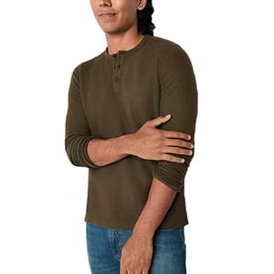 A long-sleeve olive green Henley shirt with a three-button placket, worn with sleeves slightly rolled.