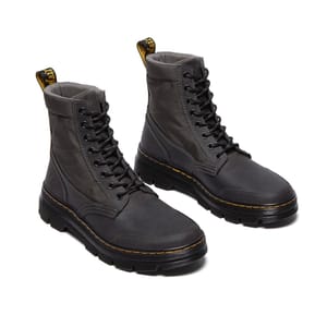 Black lace-up boots with a rugged design, featuring a textured upper, yellow stitching, and a padded collar for comfort.