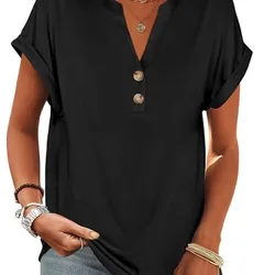 Black short-sleeve blouse with a V-neckline, button details, rolled cuffs, and relaxed fit. Paired with light blue jeans and accessorized with layered necklaces and bracelets.